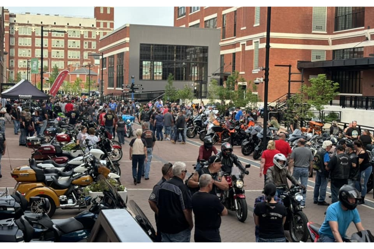 Dozens of motorcycles line Dynamo Alley at Electric Works for Bikes on the Bricks in Fort Wayne, Indiana