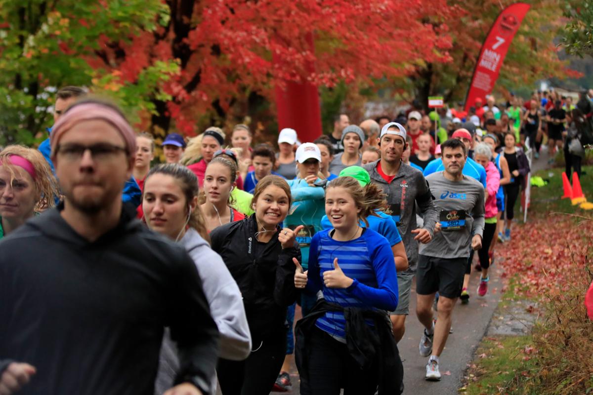 Runners on a fall trail for the Hot Cider Hustle
