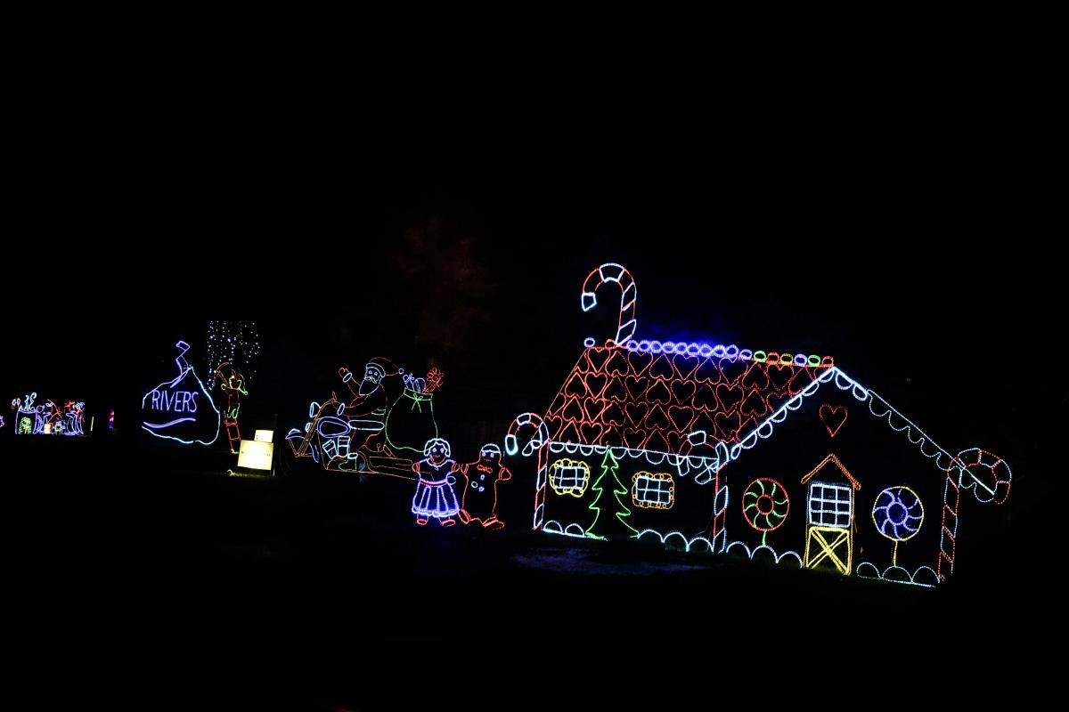 Blue Jacket's Fantasy of Lights displays with gingerbread house and people Blue Jacket's Fantasy of Lights displays with gingerbread house and people