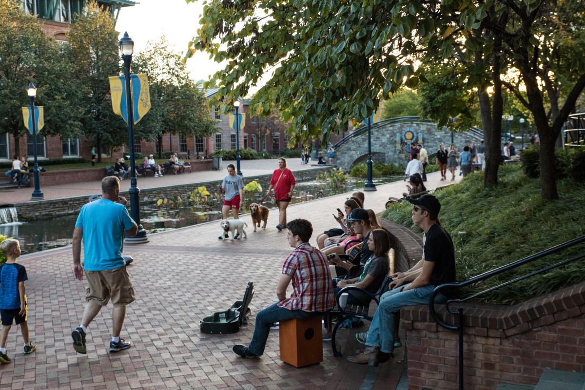 People walking through Downtown Frederick