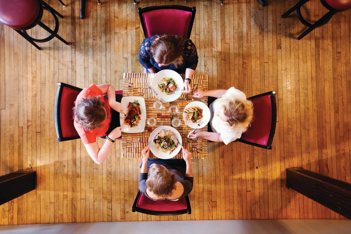 Aerial view of a group of 4 women dining at Firestone's