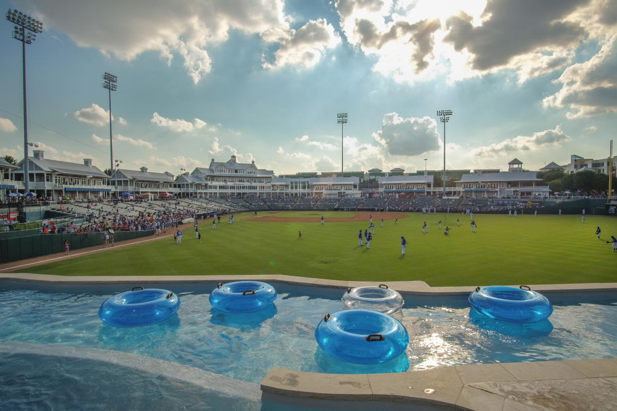 View from the pool at Frisco RoughRiders baseball stadium with floating inter tubes