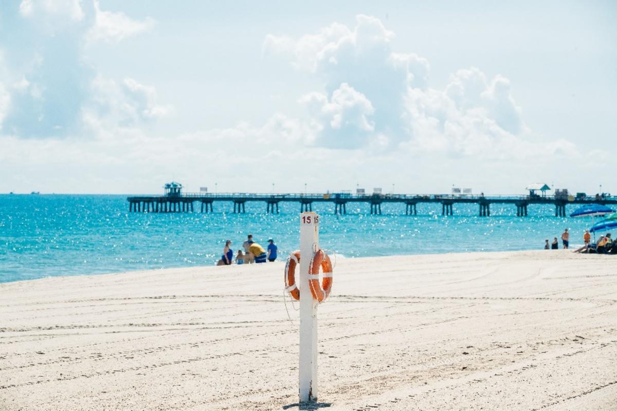 A beach view of Anglin's Pier in Lauderdale by the Sea