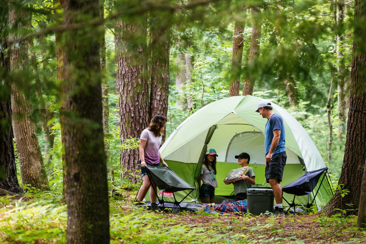 Family camping outdoors
