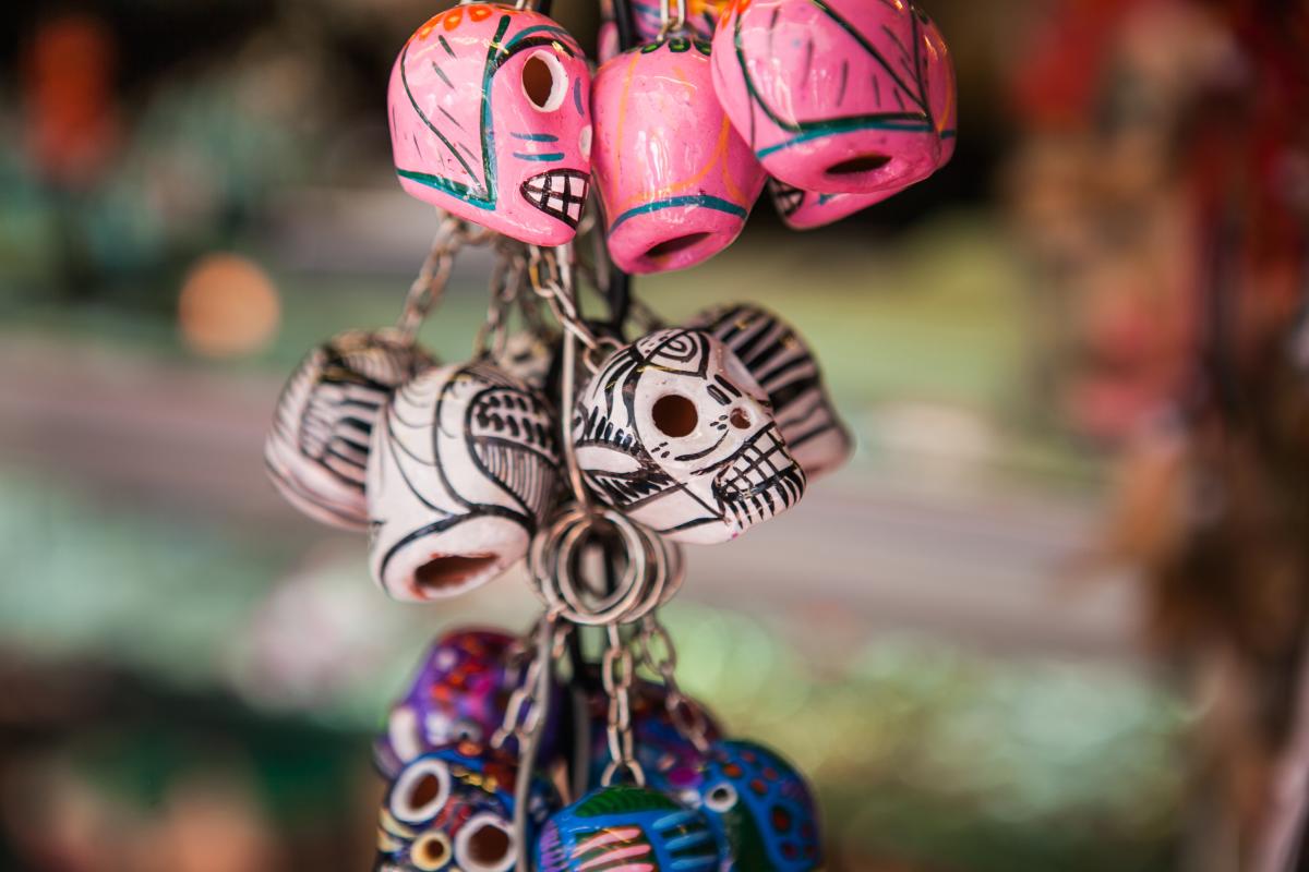 Traditional Mexican souvenir skulls on the market. Travel background for Mexico, Latin America.