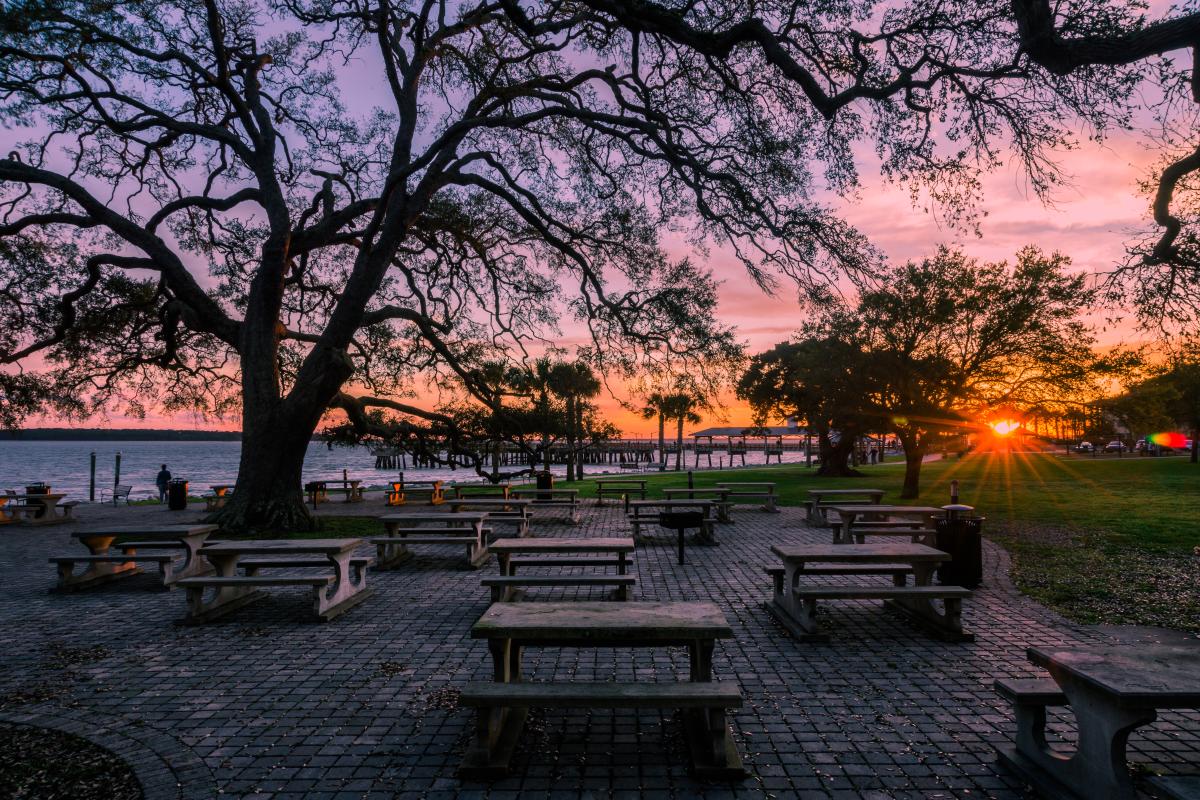 The sunsets behind the Neptune Park picnic area, an oceanfront public park on St. Simons Island, Georgia
