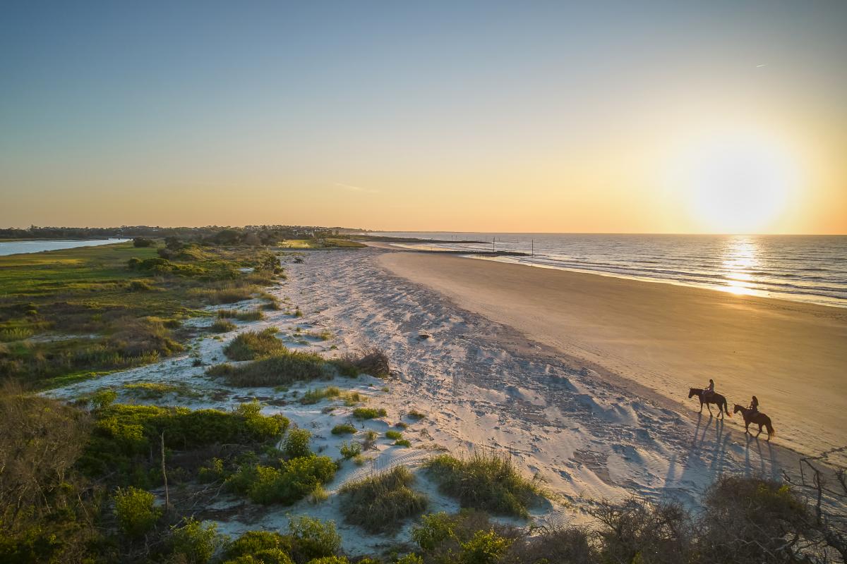 People riding horses on Sea Island