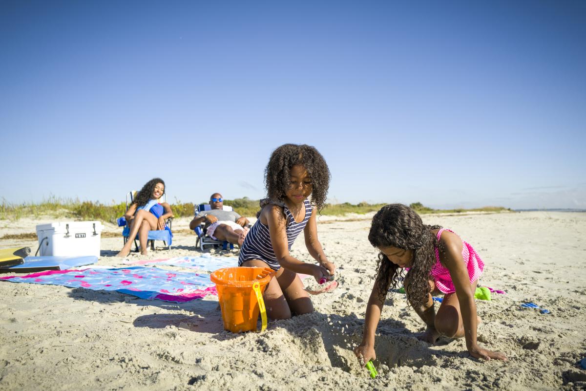 Family on the beach in the Golden Isles