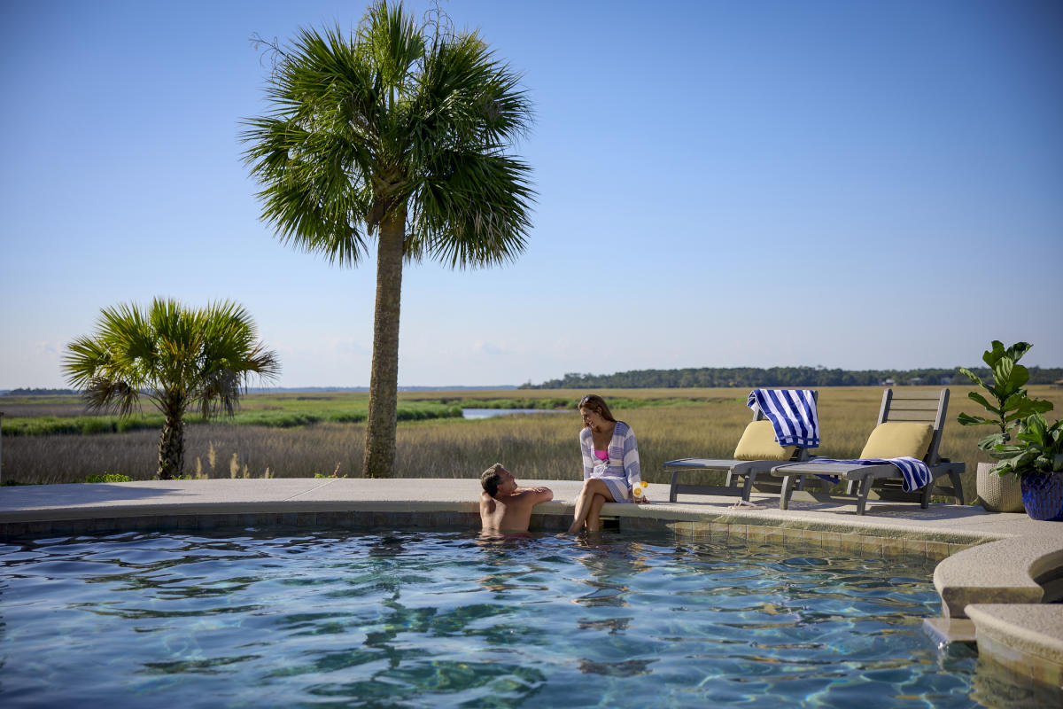 Couple at marshside pool