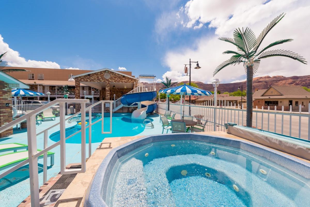 The pool, jacuzzi and waterslide at Expedition Lodge in Moab, Utah.