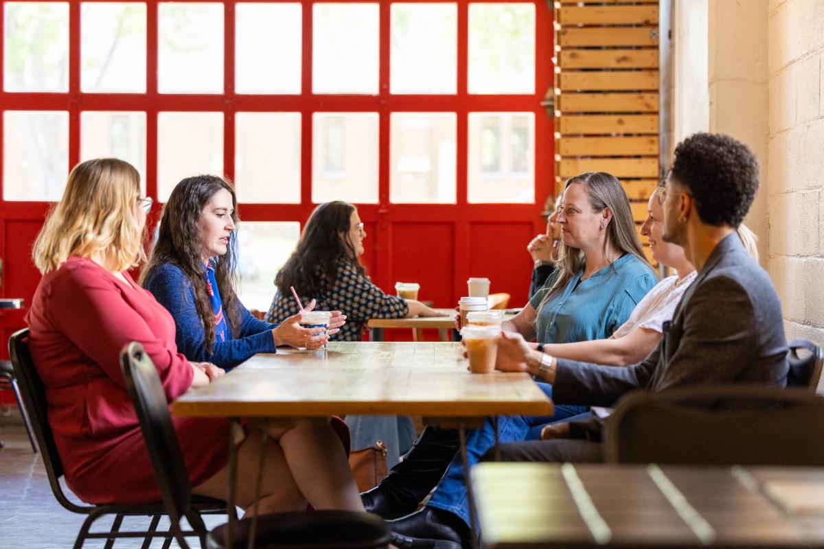 Business owners networking at John Galt Coffee Company, a local Greeley small business.