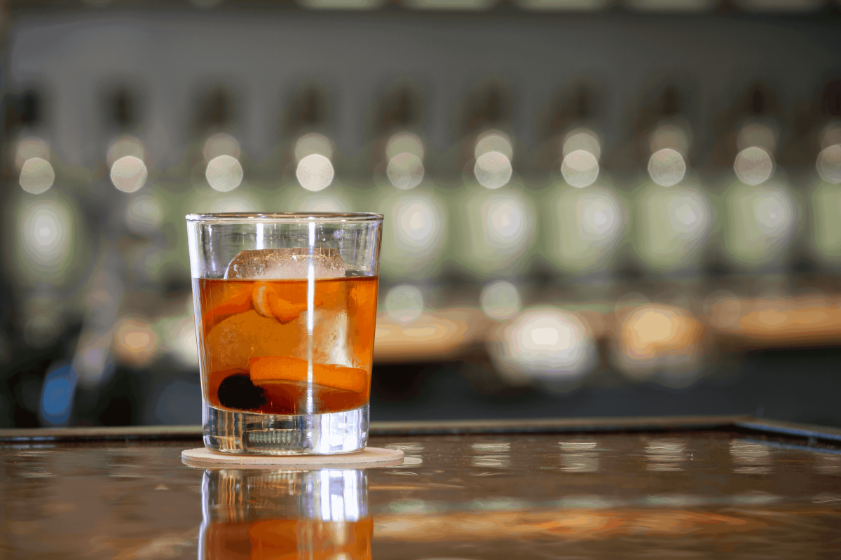 A drink sitting on a bar