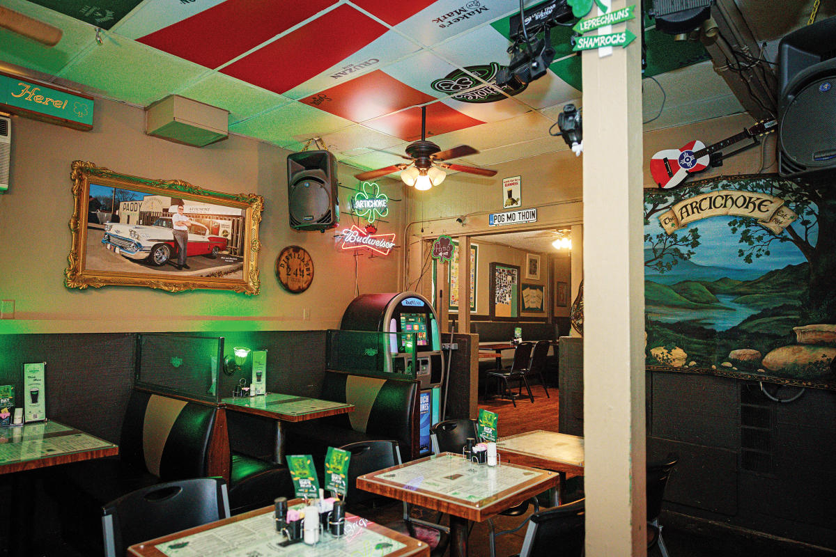 tables and booths inside Irish bar