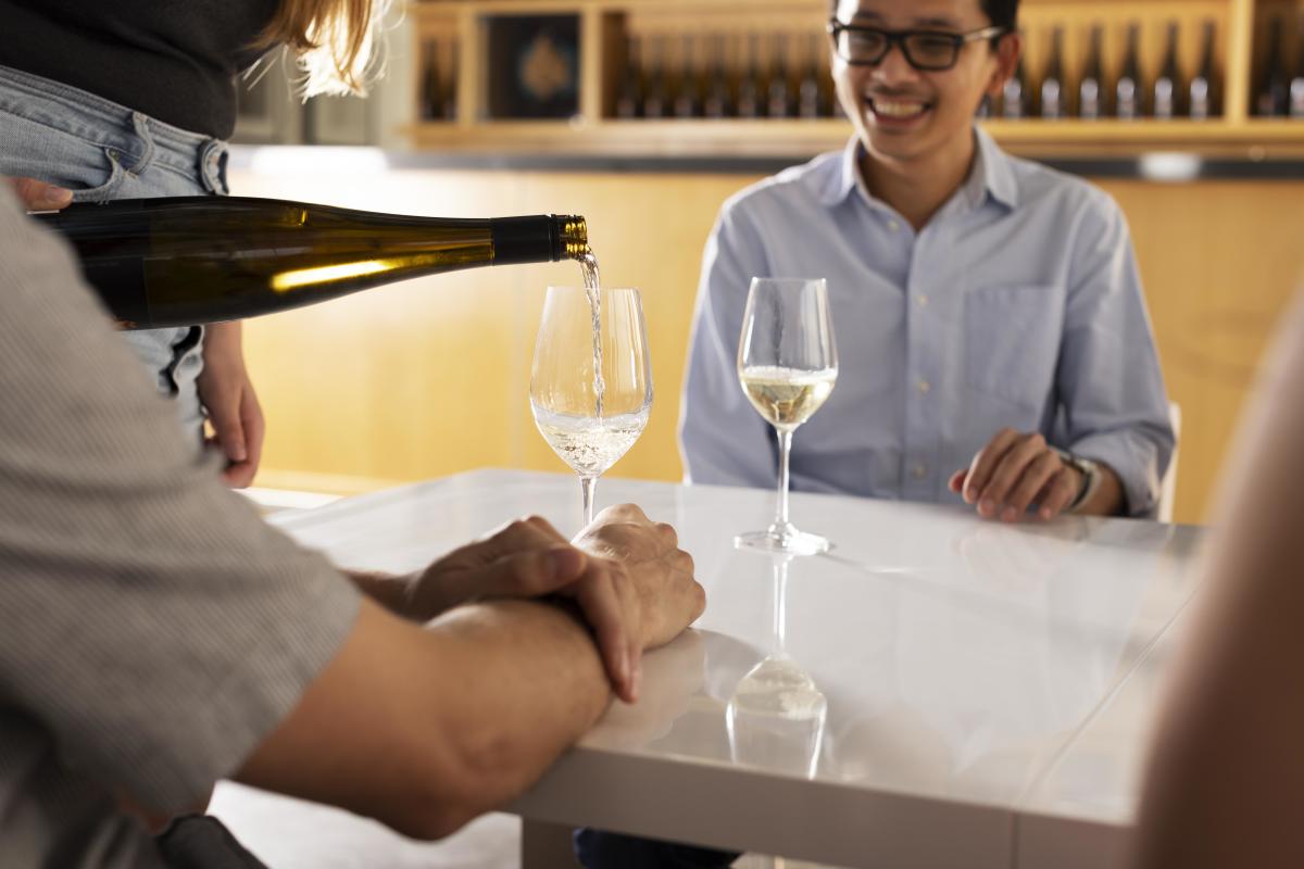 Wine being poured into a wine glass