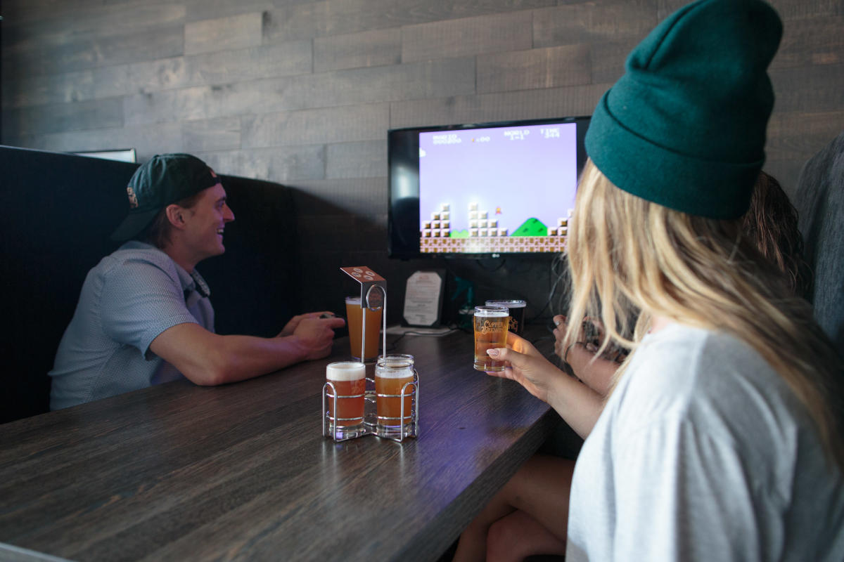 A group of friends drinking beer at Copper Brewing