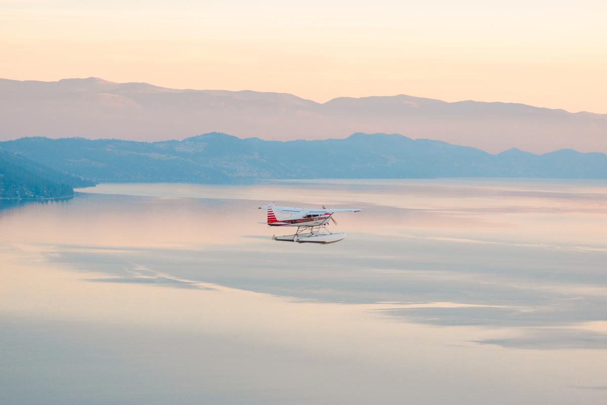 Plane flying over Okanagan Lake