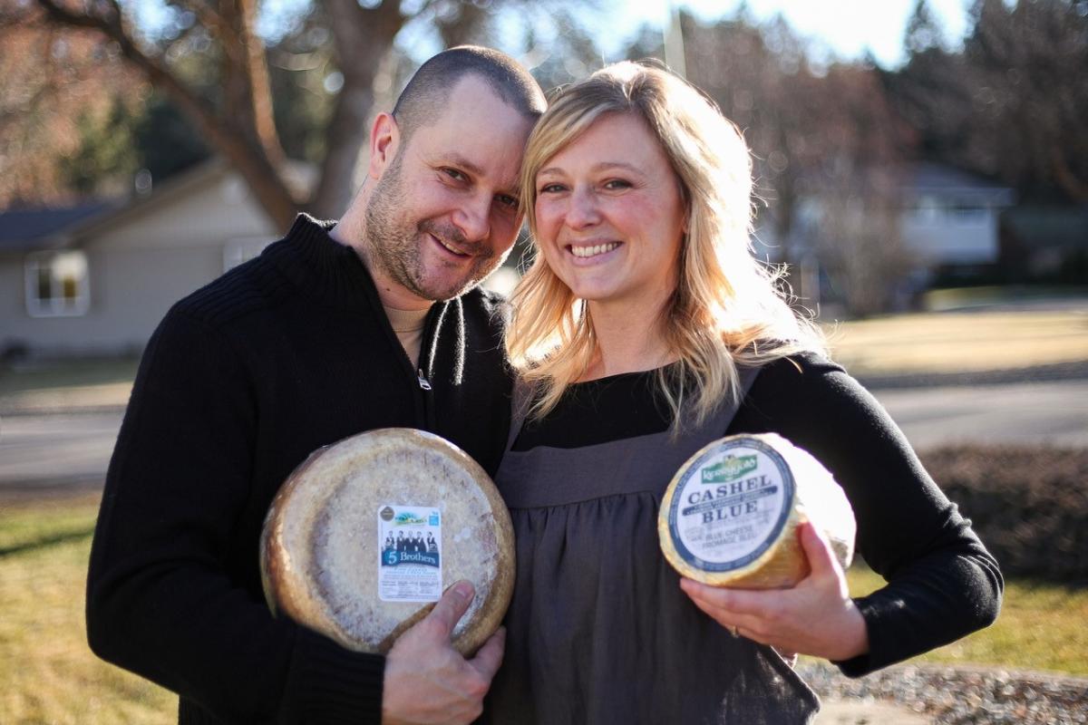 Perseval & Young Cheesemongers - Owners holding wheels of cheese