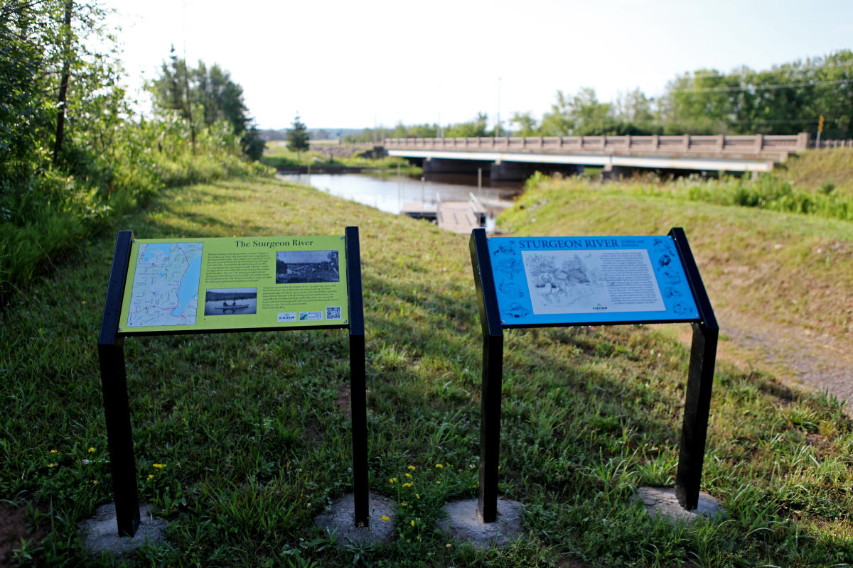 Interpretive signage at kayak launch on sturgeon river.