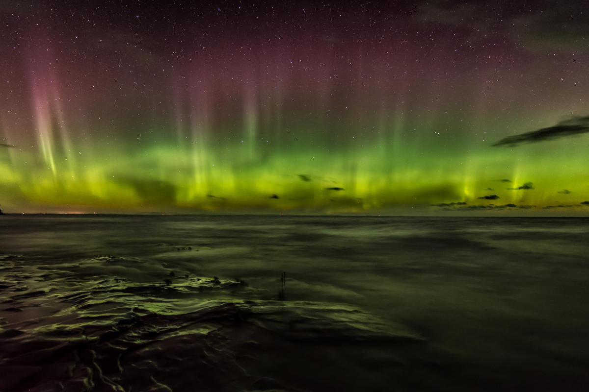 Northern Lights and Stars over Lake Superior horizen.