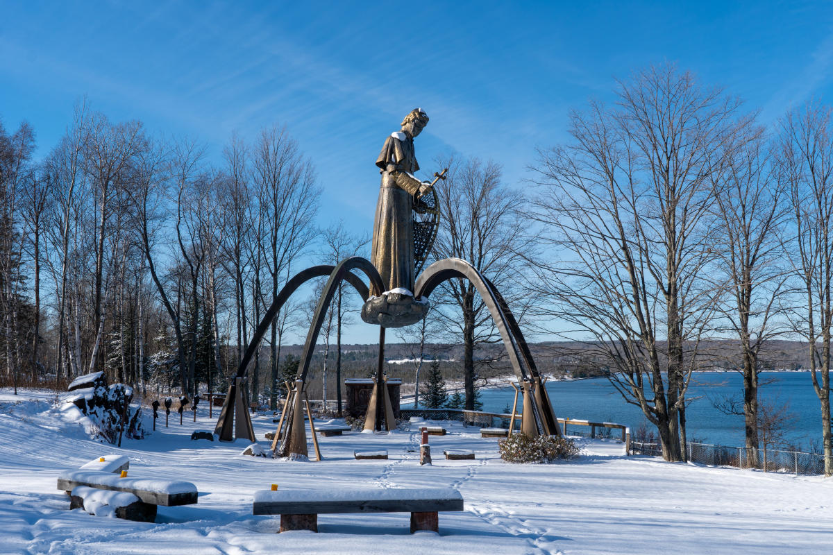 The Bishop Baraga Snowshoe Priest statue can be seen overlooking Lake Superior.