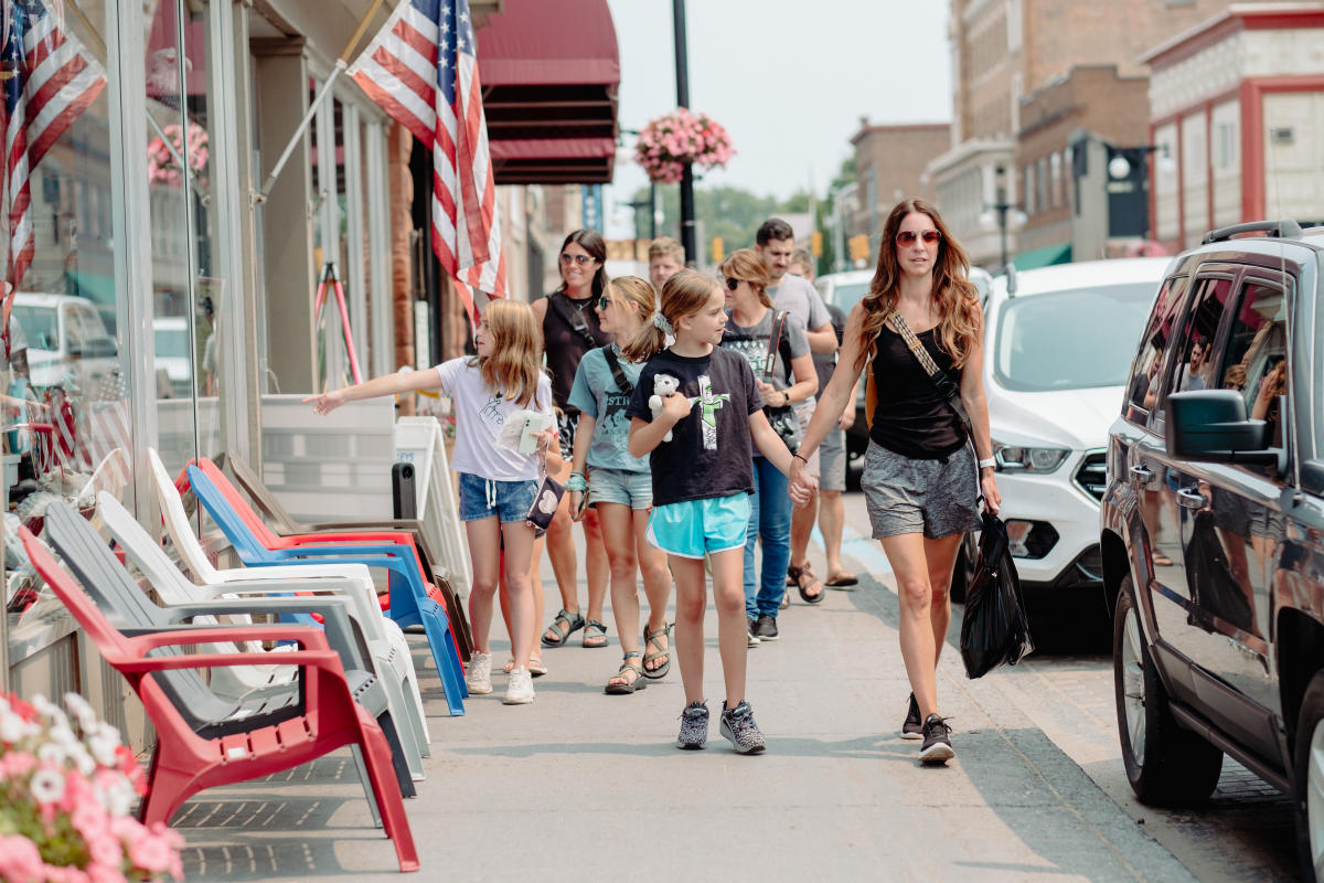 A group window-shops in downtown Houghton.