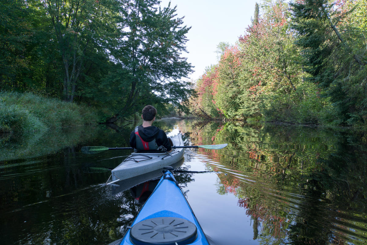 Two paddlers exploring the Sturgeon River Sloughs