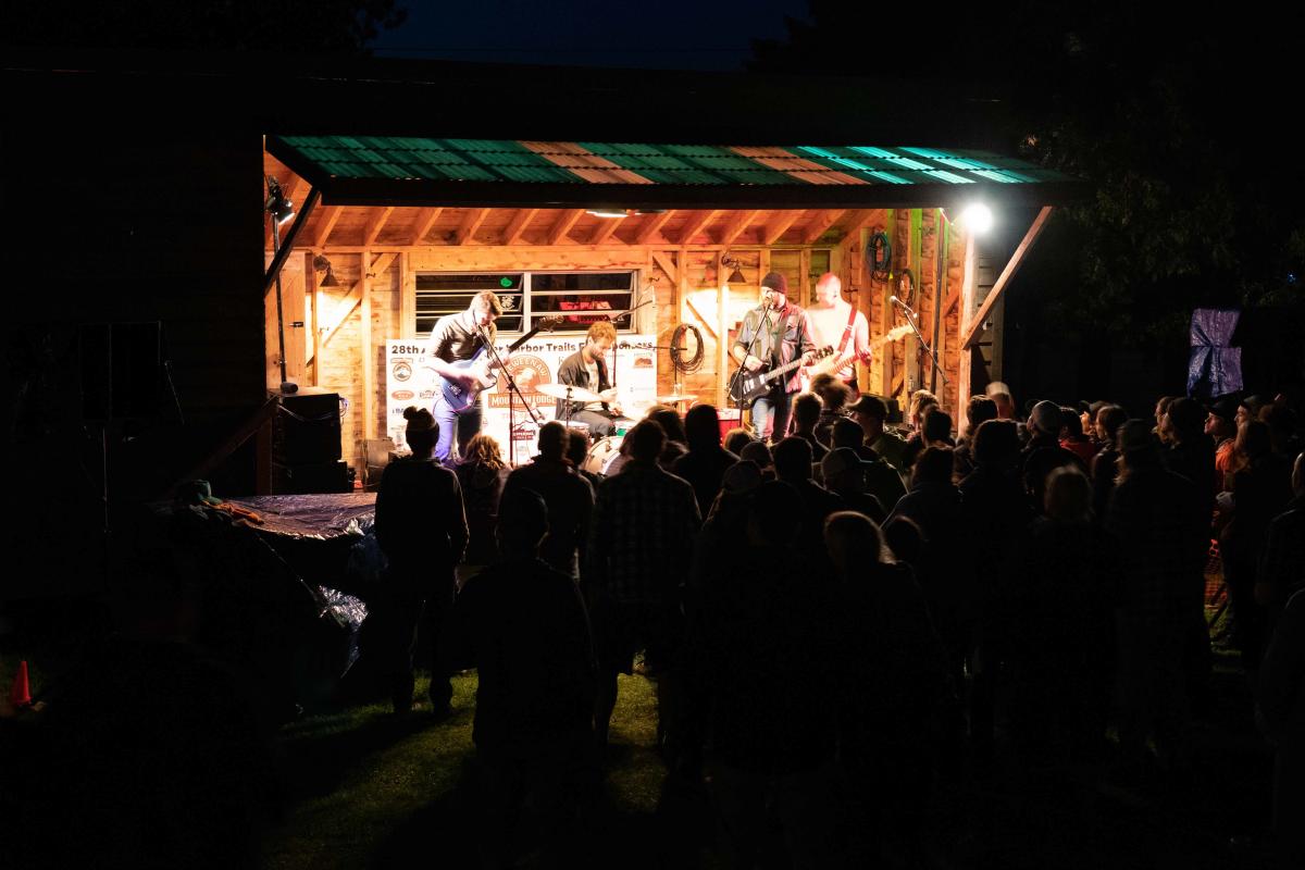 A band playing live music at Trails Fest