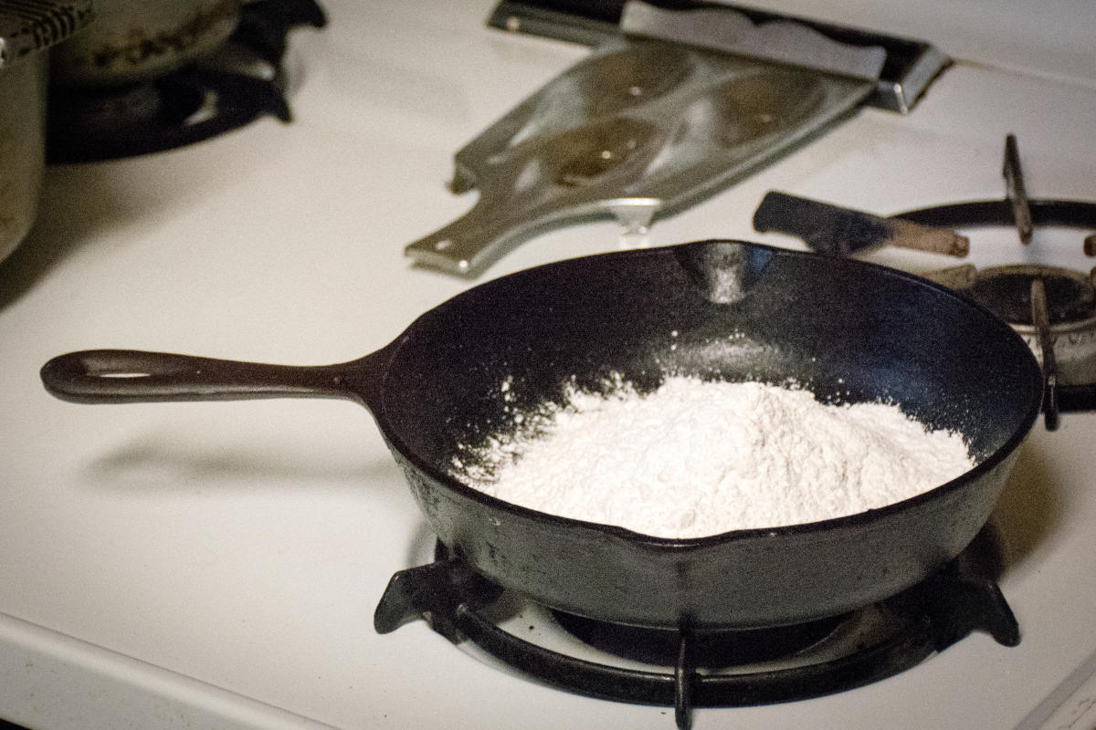 Flour in Cast Iron on Stove Top