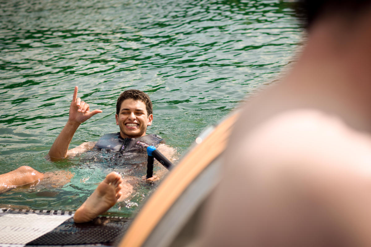 Swimming in lake with life jacket