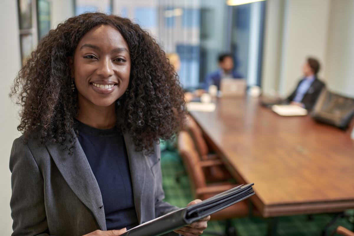 Lady holding a portfolio binder