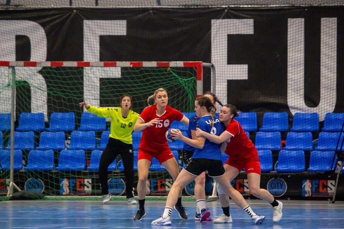 Team USA faces off against Team Canada in a team handball match at Lansing City Arena.
