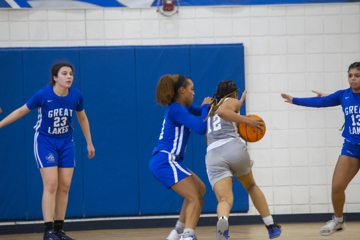 Women playing basketball