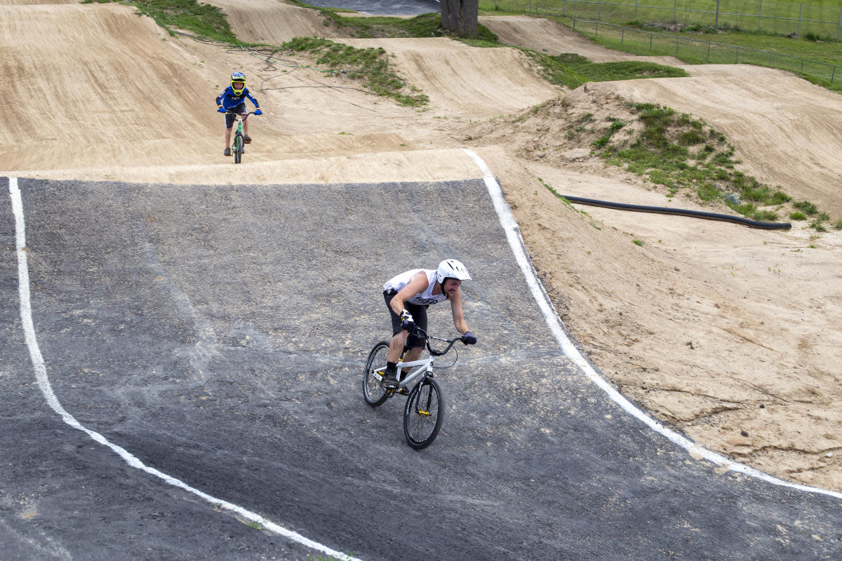 People riding bikes on the Capital City Family BMX Track
