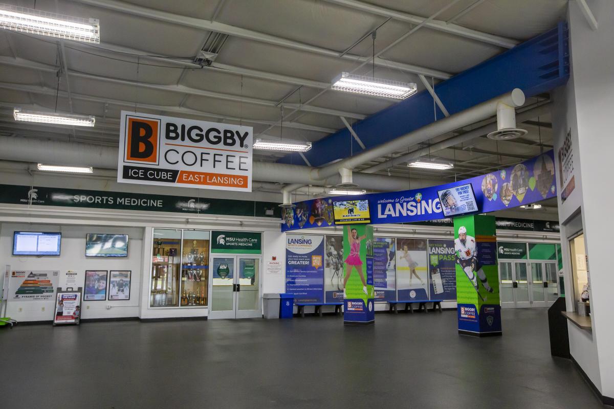 Lobby of the Biggby Coffee Ice Cube East Lansing with Welcome to Lansing signage