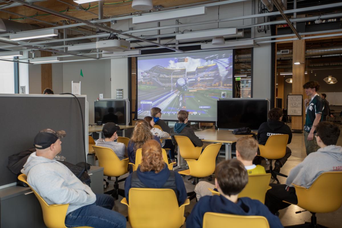 People competing in and observing an esports event at MSU.