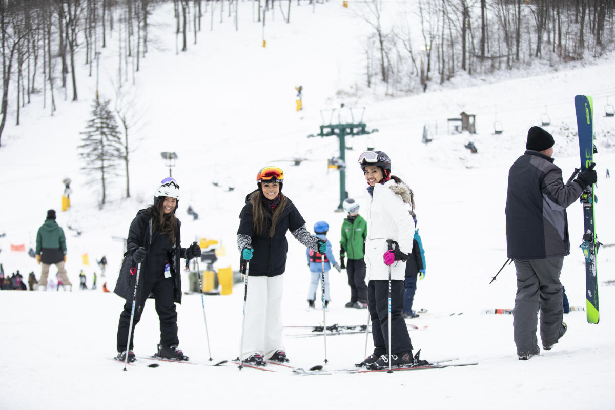 Skiers enjoy the snow-covered slopes at Hidden Valley resort.