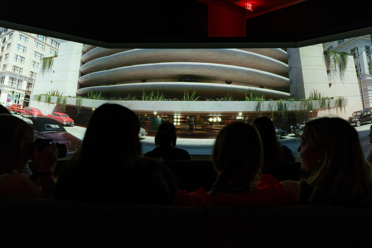 Patron’s view a movie as part of the “Frank Lloyd Wright's Southwestern Pennsylvania” exhibit at The Westmoreland Museum of American Art in Greensburg.