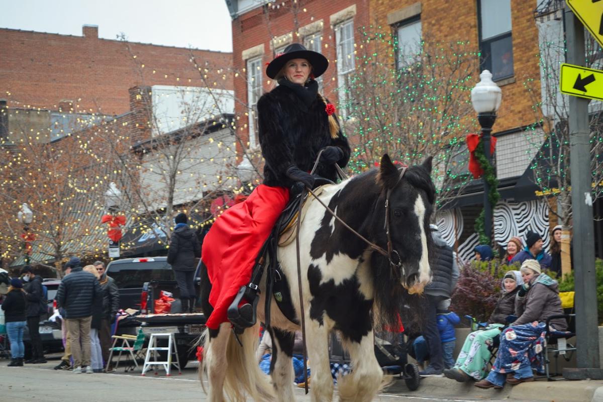 A horse and rider in the Lawrence Old-Fashioned Christmas Parade on Mass Street