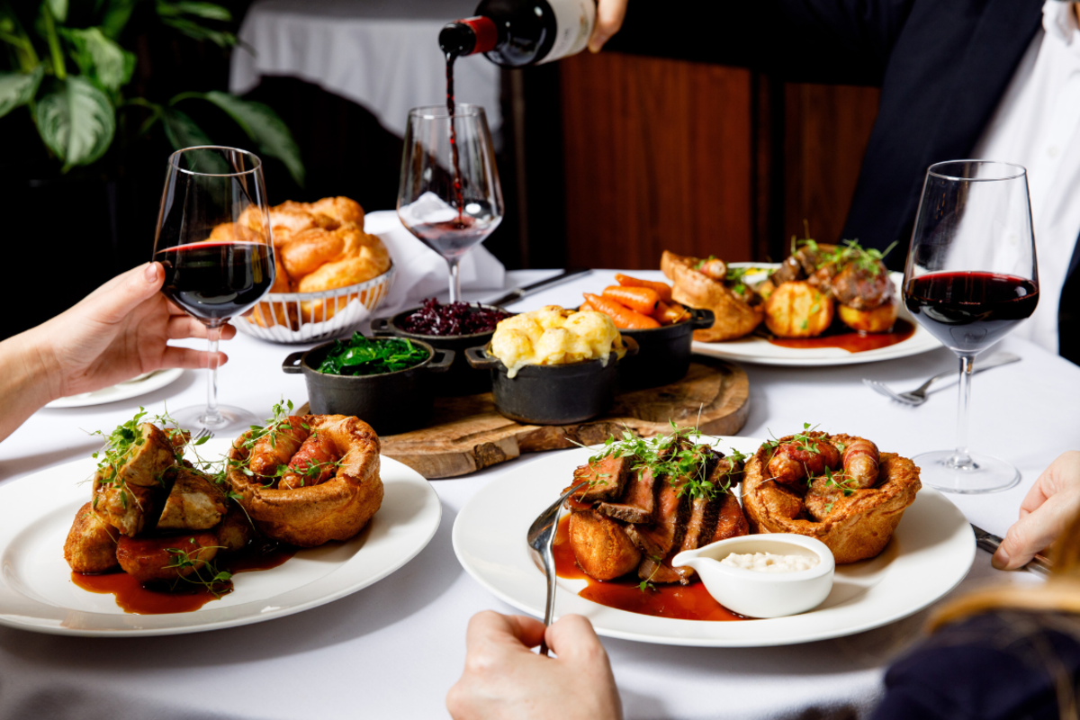 A group of business people enjoying a sunday roast.
