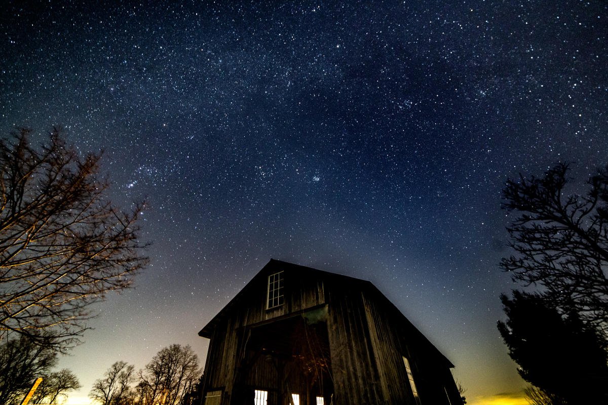 Barn with stars in the sky
