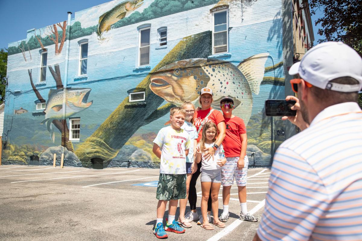 Family at Trout Culture Mural