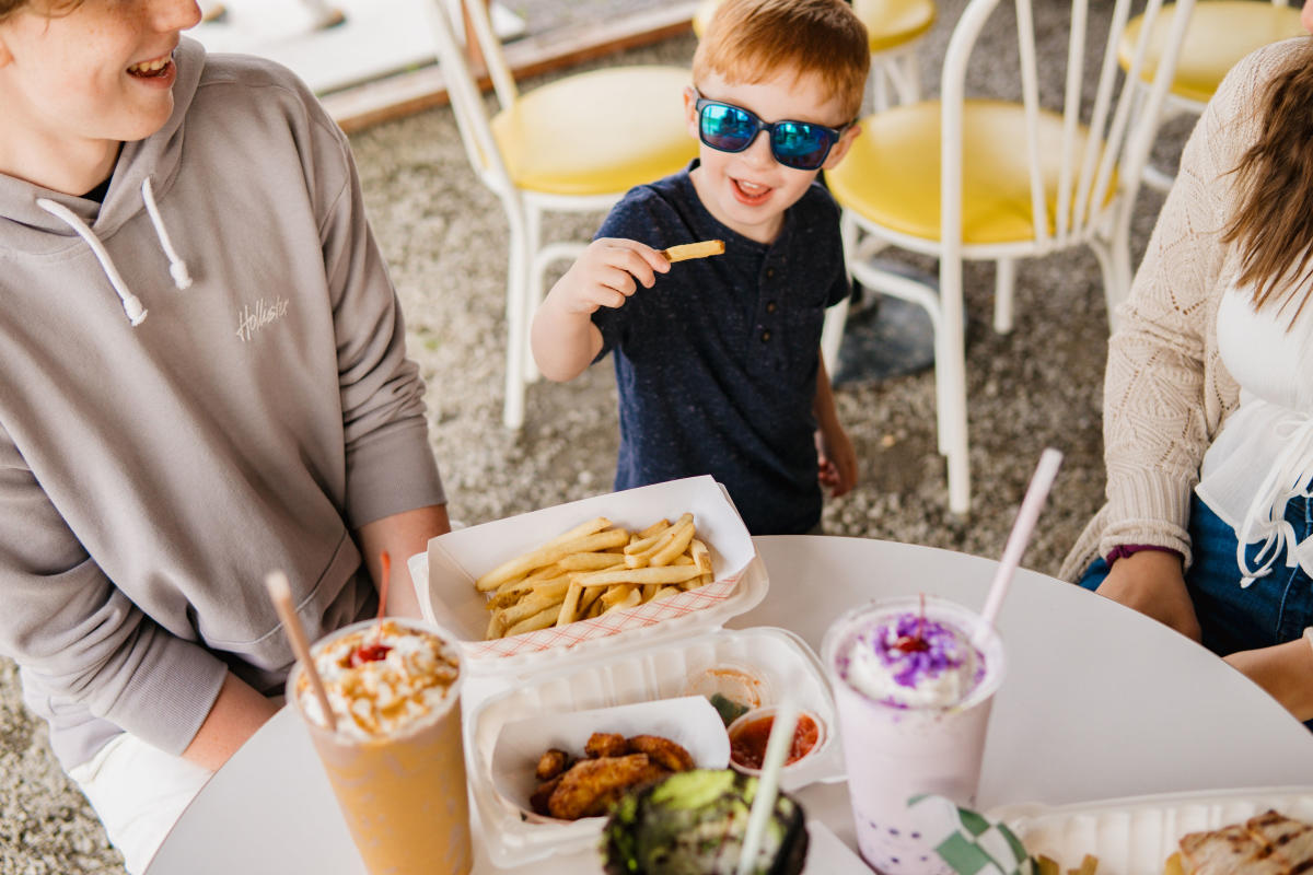 Kid eating at Kish-a-wa