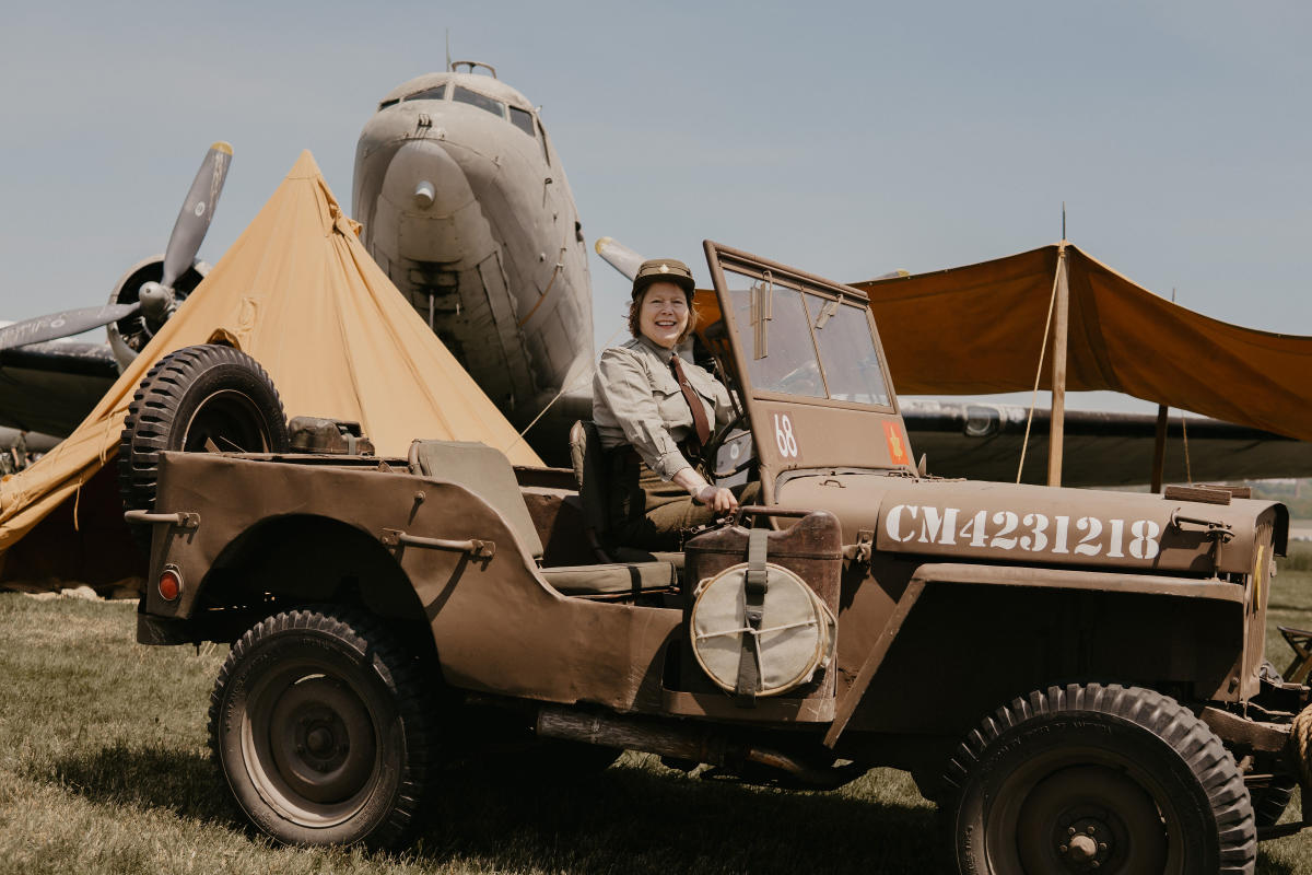 Woman on Car at Warplane Museum
