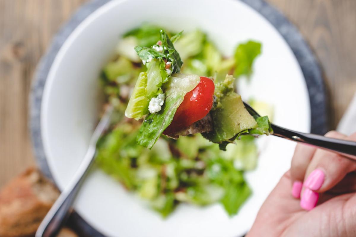 Salad in a bowl at Lettuce Be Loco