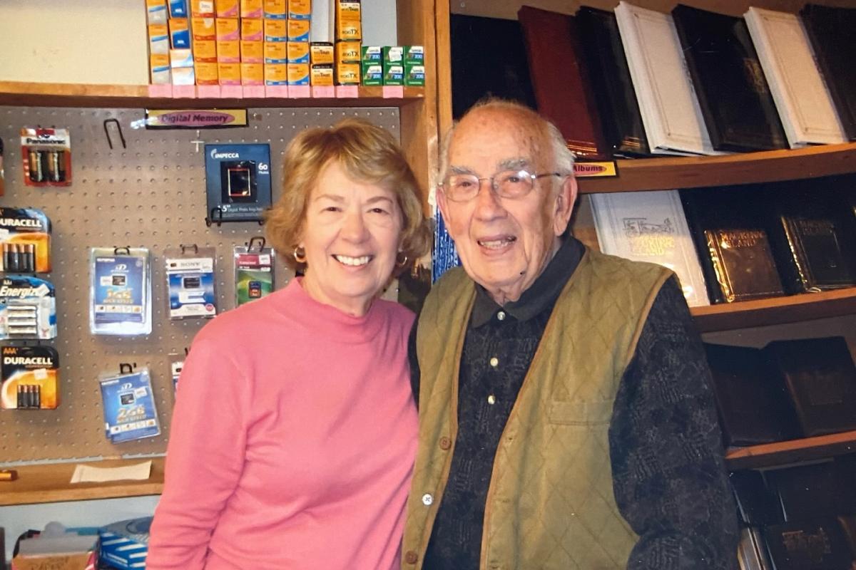 Beverly and Bob Benjamin pose for a portrait inside Benjamin of Mackinac
