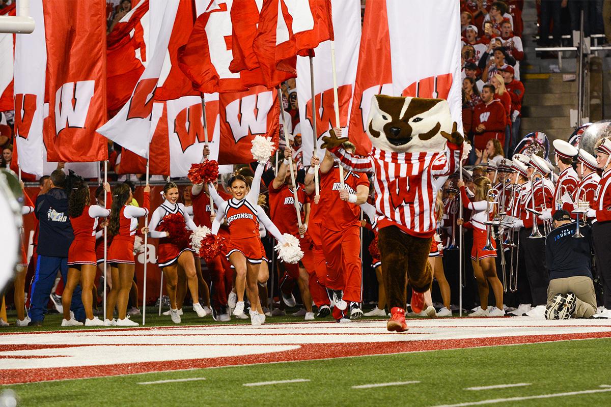 Bucky the Badger and cheerleaders at a US–Madison Badger football game