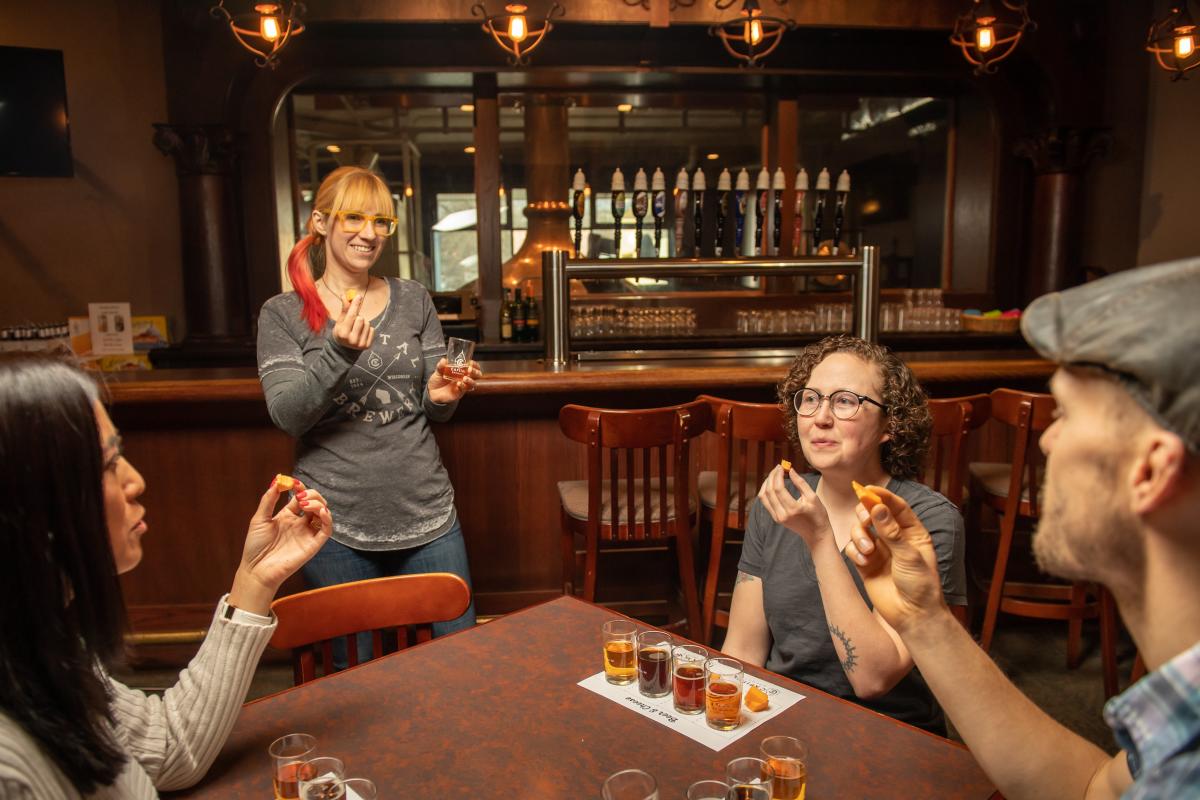 A group samples a beer flights at Capital Brewery