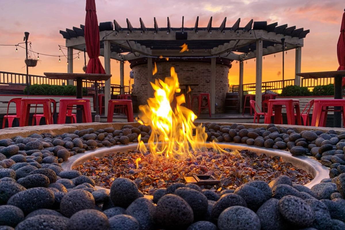 A rooftop fire pit at Lone Girl Brewing