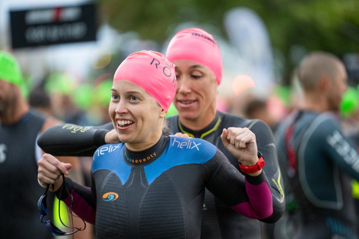 Two swimmers preparing for IRONMAN
