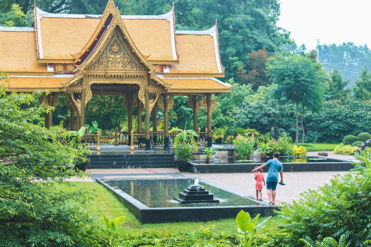 Two kids in front of Olbrich Gardens Thai Pavillioni